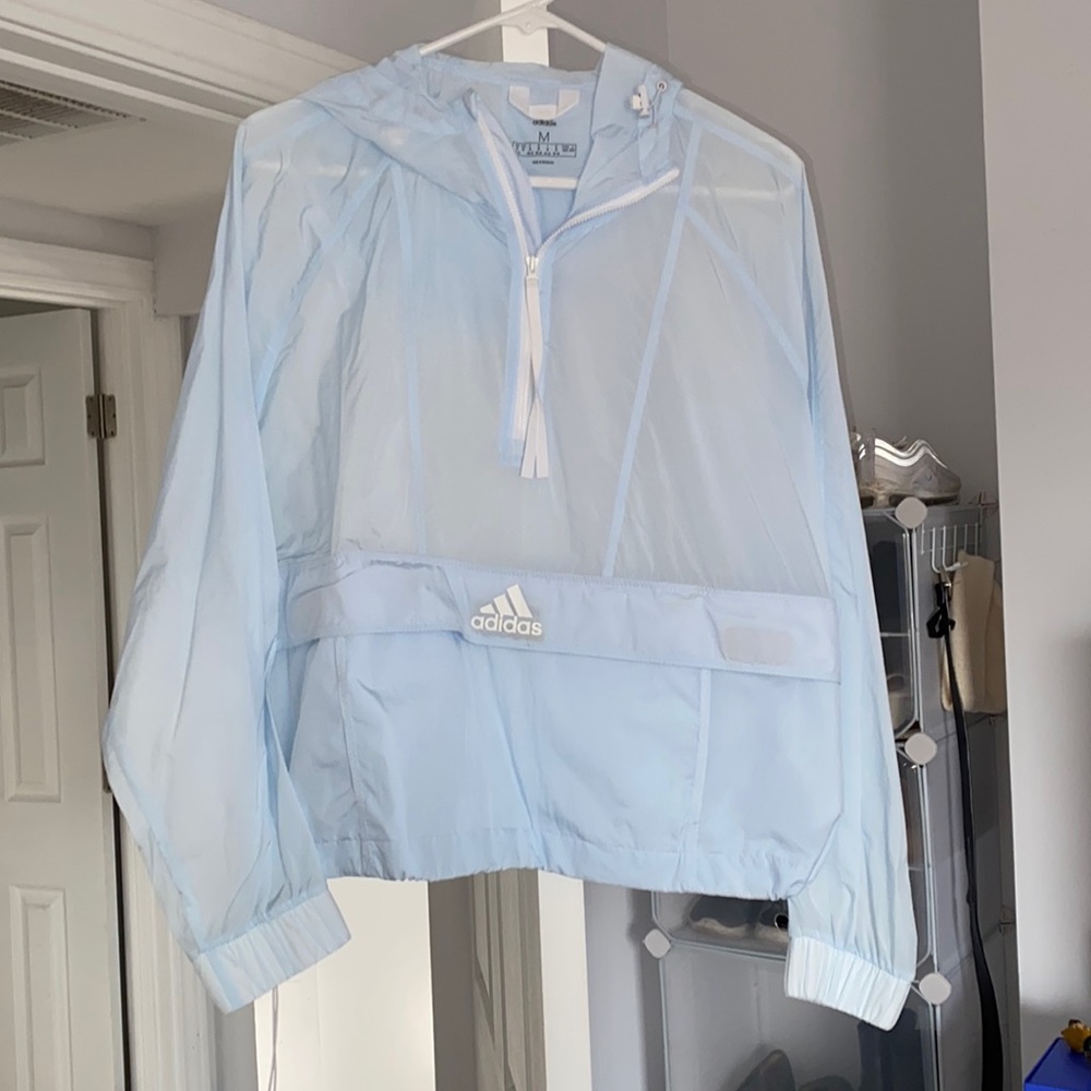 Hooded wind breaker